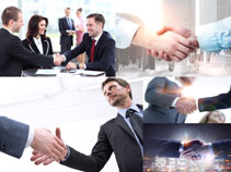 商務人士合作握手拍攝高清圖片
